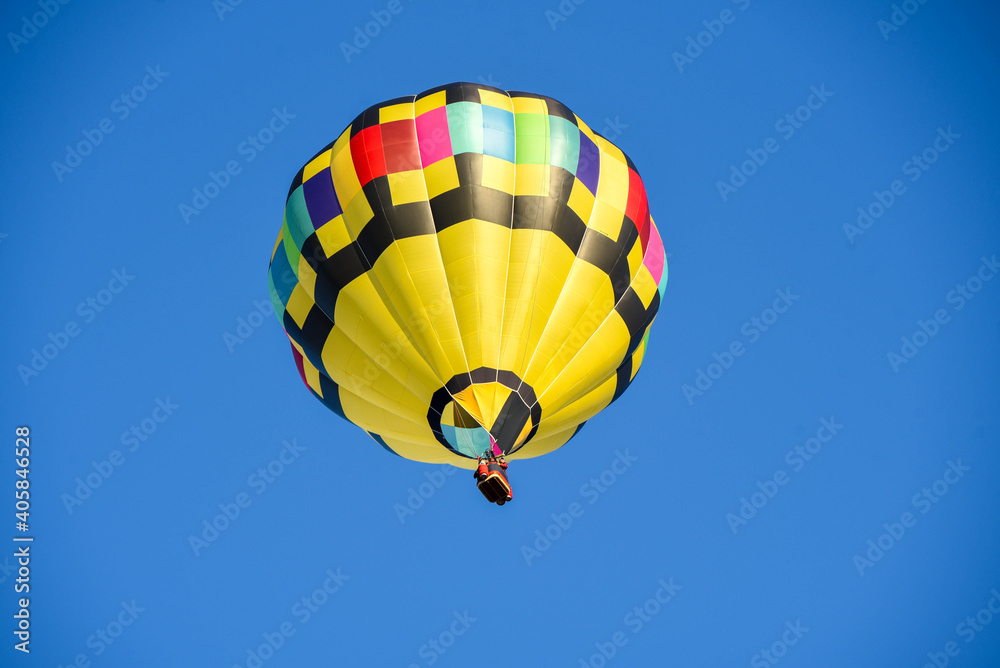 Naklejka premium I captired this image one morning this past fall. You can see how the sky would change color as I took pictures from different angles, Hot air balloon floating free.