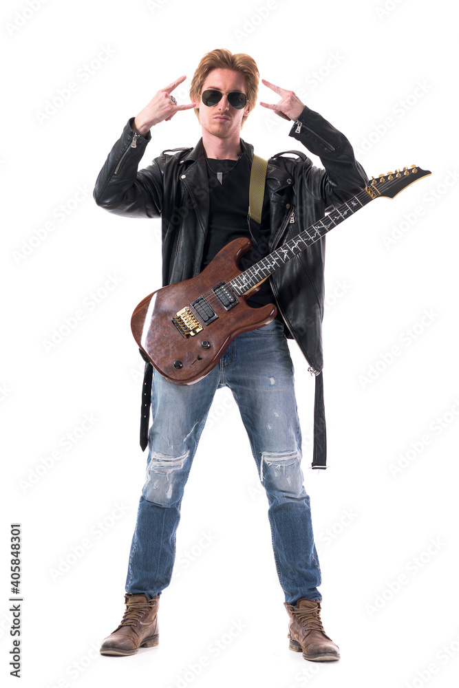 Cool macho stylish rock musician with electric guitar showing hard rock horn hand sign. Full body isolated on white background. Cool macho stylish rock musician with electric guitar showing hard rock horn hand sign. Full body isolated on white background.