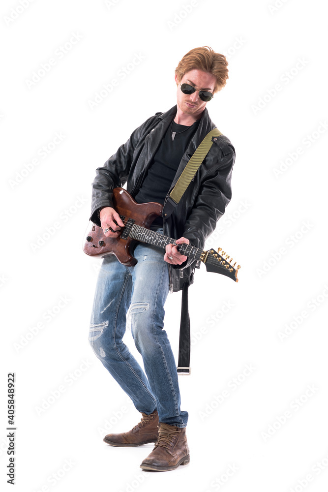 Handsome redhead man rock musician playing electric guitar with passion bending backwards. Full body isolated on white background. Handsome redhead man rock musician playing electric guitar with passion bending backwards. Full body isolated on white background.