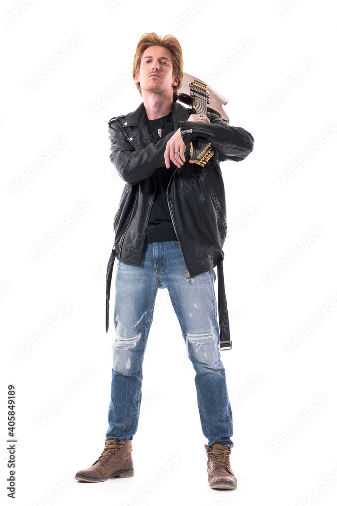 Cocky attitude macho rocker in leather jacket carrying electric guitar staring at camera with head back. Full body isolated on white background. Cocky attitude macho rocker in leather jacket carrying electric guitar staring at camera with head back. Full body isolated on white background.