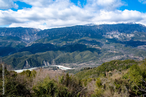Tzoumerka, Epirus, Greece - March 10, 2019: Mountain view under the clouds