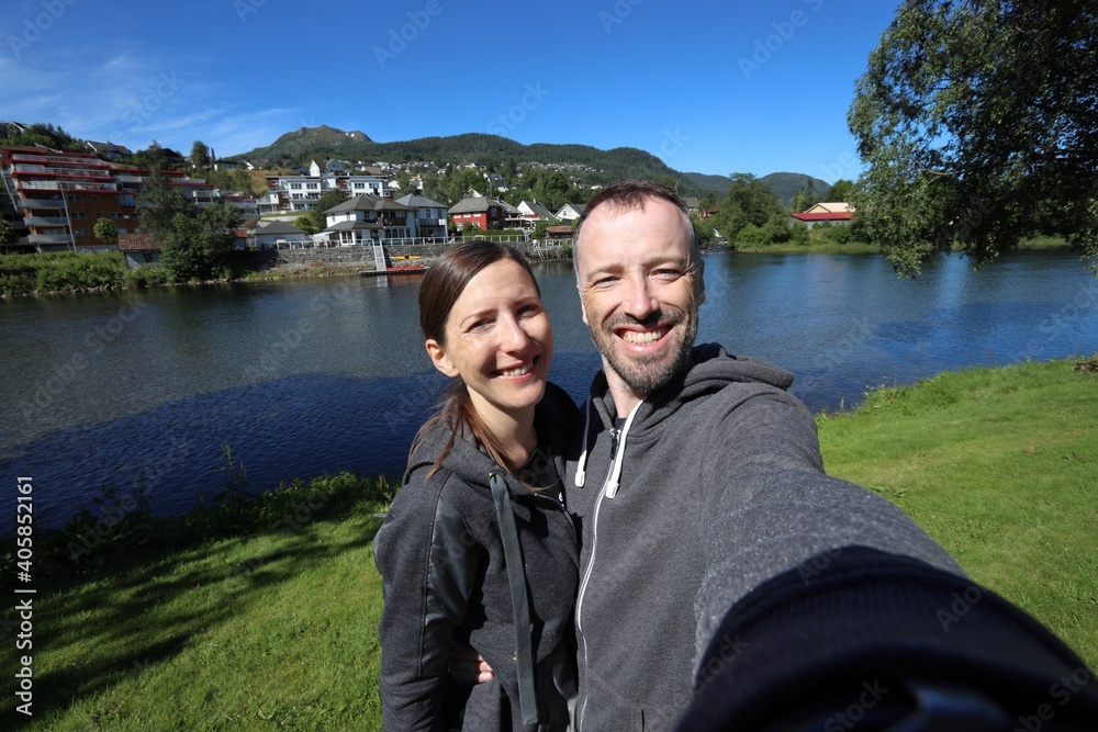 Fototapeta premium Norway couple travelers in Forde. Summer active vacation.
