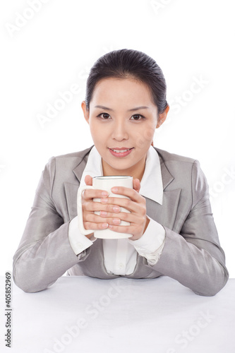 Smiling business woman holding mug smiling portrait