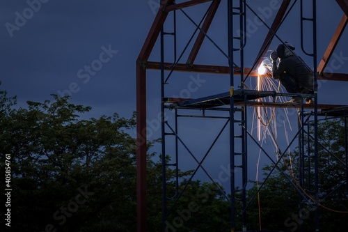 Welder working in work site.