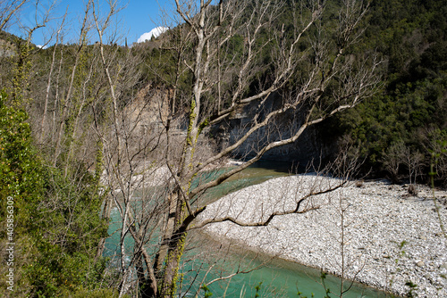 Tzoumerka, Epirus, Greece - March 10, 2019: Arahthos river on a sunny day photo