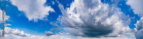 White clouds in blue summer sky panoramic background