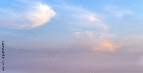 Picturesque evening sunset sky background with clouds