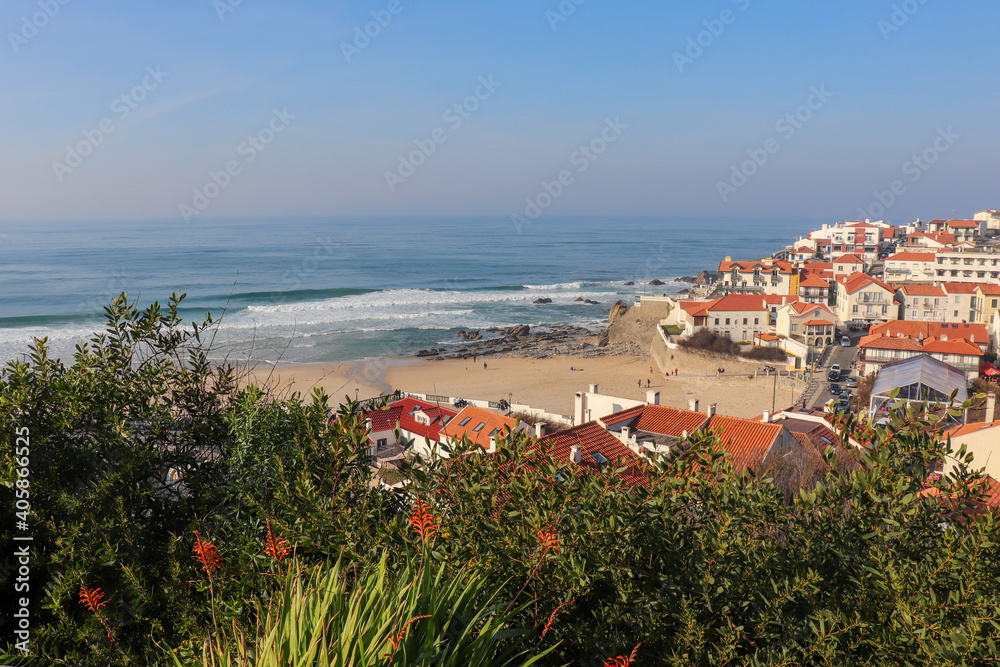 coastal village on the ocean from the bird's eye view directly on the beach