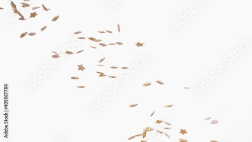 Sugar stars fall in water in an aquarium on white background, objects into liquid. healthy food concept