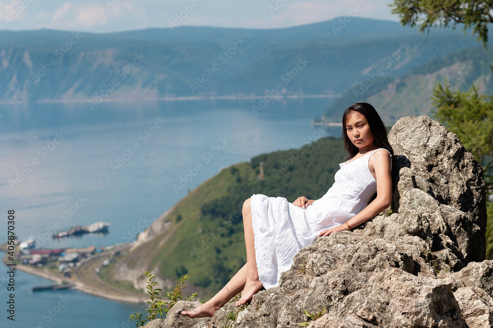 A girl of Buryat appearance on Lake Baikal