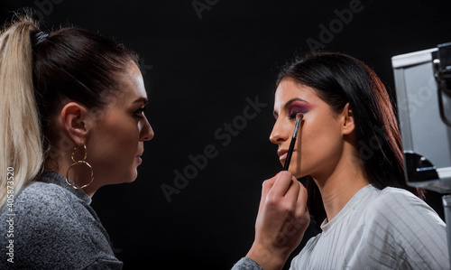 Studio series of doing fashion makeup