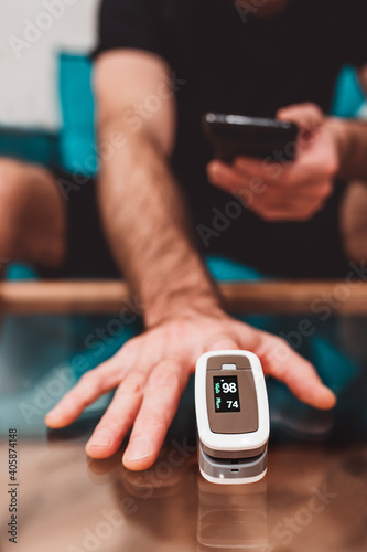 Portable electronic pulse oximeter for measuring oxygen saturation at the finger - covid prevention