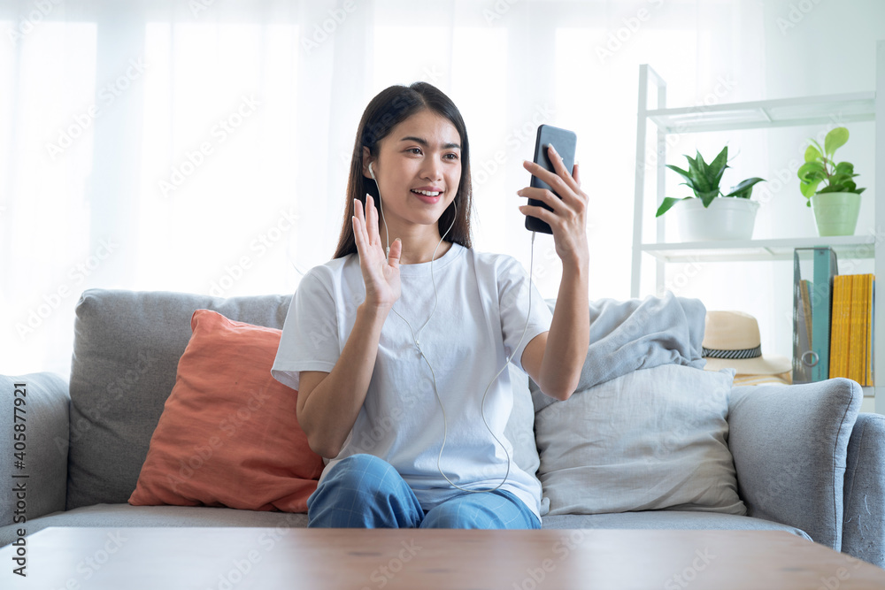 Asian woman making a video call to her friend, Online communication concept. Asian woman making a video call to her friend, Online communication concept.
