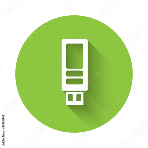 White USB flash drive icon isolated with long shadow. Green circle button. Vector.