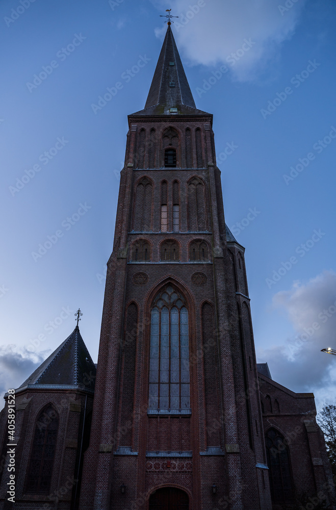 Front of Dutch cathedral in Schagen, Netherlands at blue hour