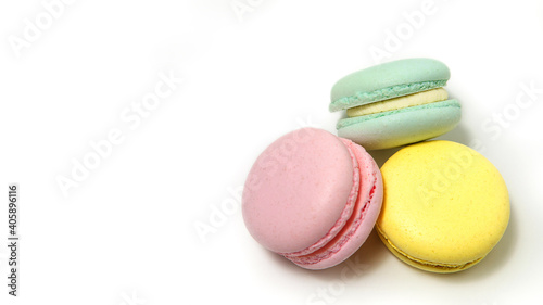 Obraz na plátně Almond cookies, in pastel colors on a white background