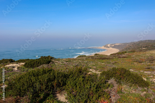 Coastal view to the horizon over the ocean and sandy beach