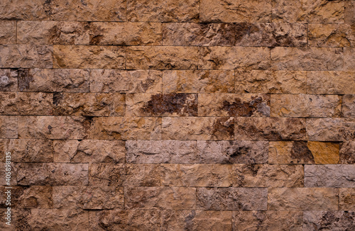 Red brick pattern. Old brick wall with cracks and scratches. Horizontal background of wide brick wall