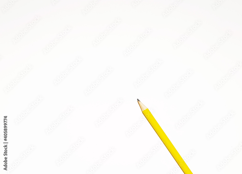 Presentation template with copy space by top view close up macro photo of wooden yellow pencil isolated on white paper that look minimalist and clean. Pencil on paper. Space for text. Presentation template with copy space by top view close up macro photo of wooden yellow pencil isolated on white paper that look minimalist and clean. Pencil on paper. Space for text.