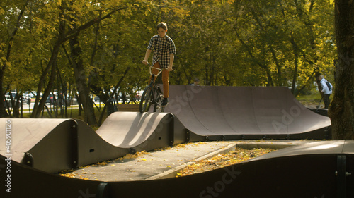 Biker riding on the pump track