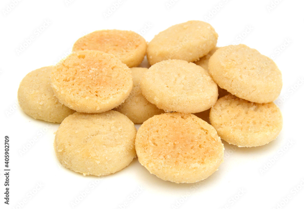 Freshly baked sugar cookies on white background