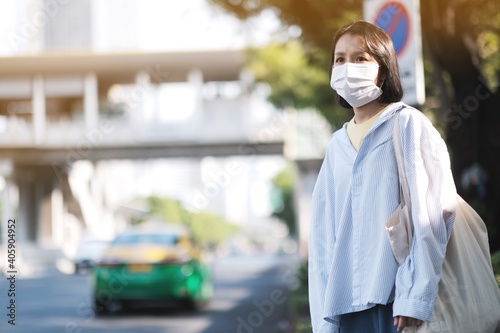 Asian women with face mask in the streets