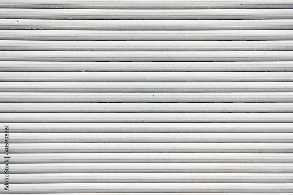 White iron tin fence lined background. Metal texture White iron tin fence lined background. Metal texture
