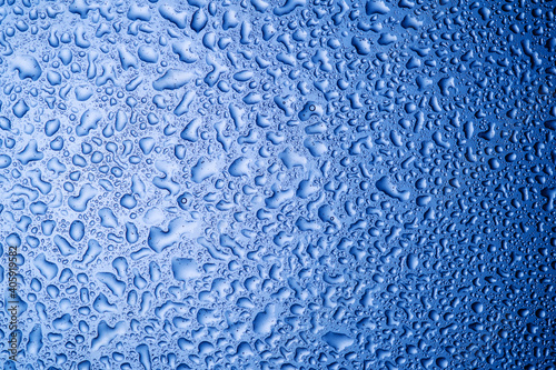 water drops on glass on blue background1