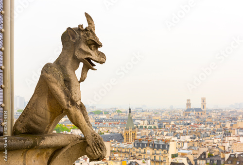 Gargoyle on Notre Dame de Paris Cathedral of Paris. © resul