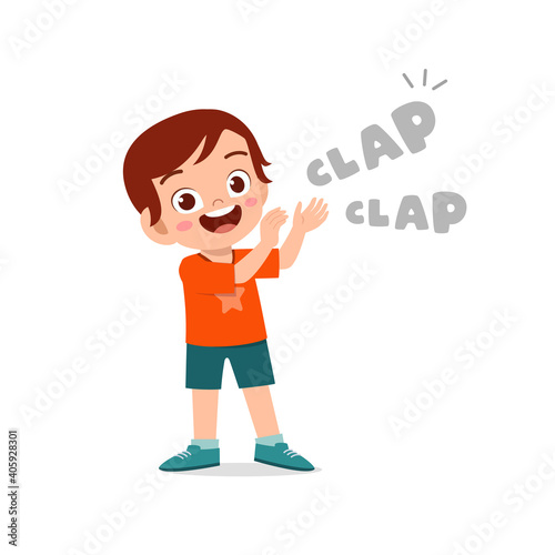 happy cute little kid boy standing and clap the hand