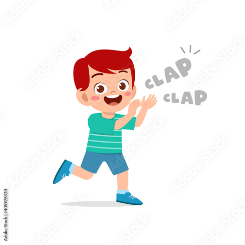 happy cute little kid boy standing and clap the hand