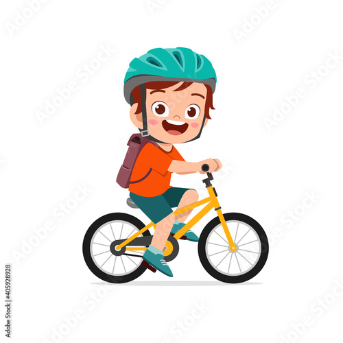 Fototapeta Naklejka Na Ścianę i Meble -  happy cute little kid boy riding bicycle