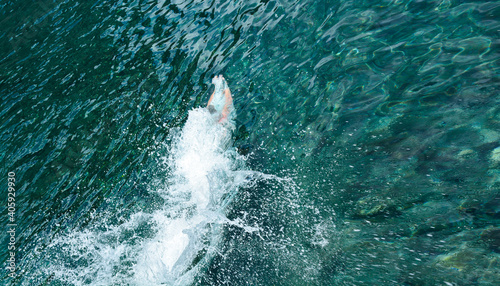 Refreshing, sporty jump and swimming into the sea © JOE LORENZ DESIGN