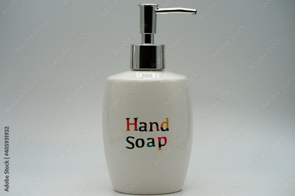 Obraz premium Hand soap in a white ceramic push pump bottle