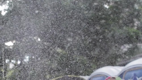 Snow flakes falling in brazilian carnival foam