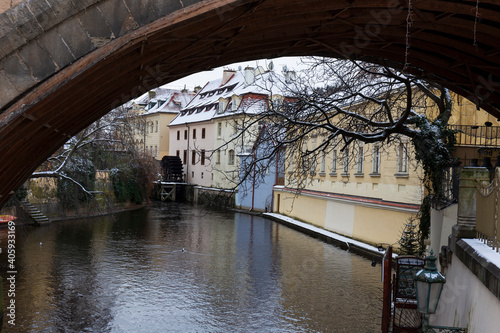 Canvas Print Romantic snowy Prague Flourmill above Certovka, Czech republic