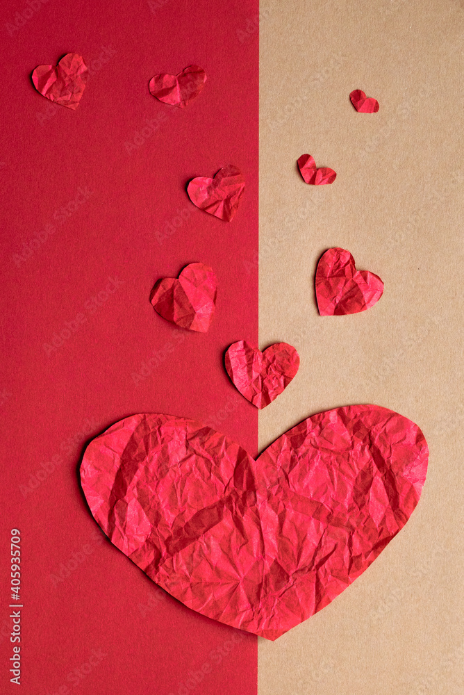 Fototapeta premium romantic red and camel card with red hearts of different sizes