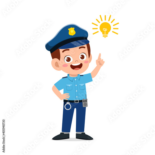 happy cute little kid boy wearing police uniform and thinking with light bulb sign