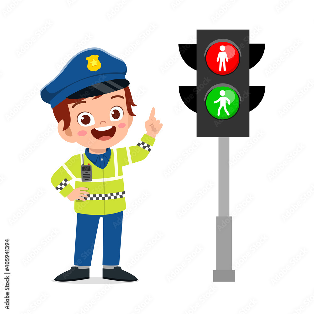 happy cute little kid boy wearing police uniform and stand beside traffic lamp