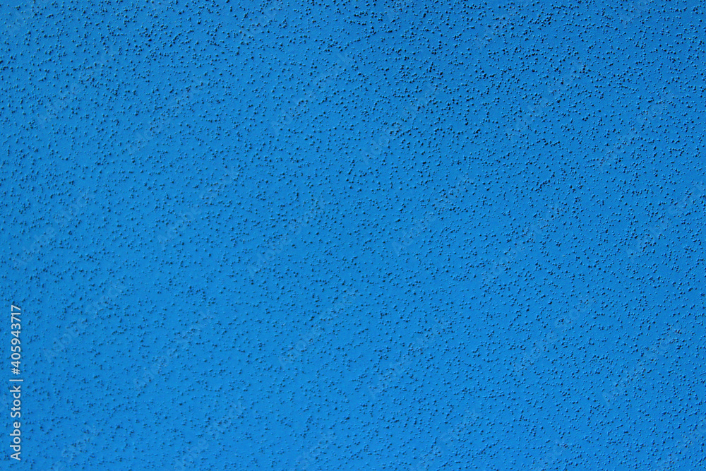 Blurry image of blue wall texture background. Abstract texture backdrop, horizontal view, copy space for text.