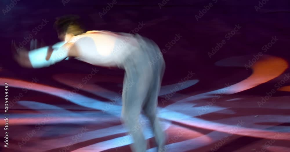 Circus show with a young man doing a cartwheel with a backflip, 4k