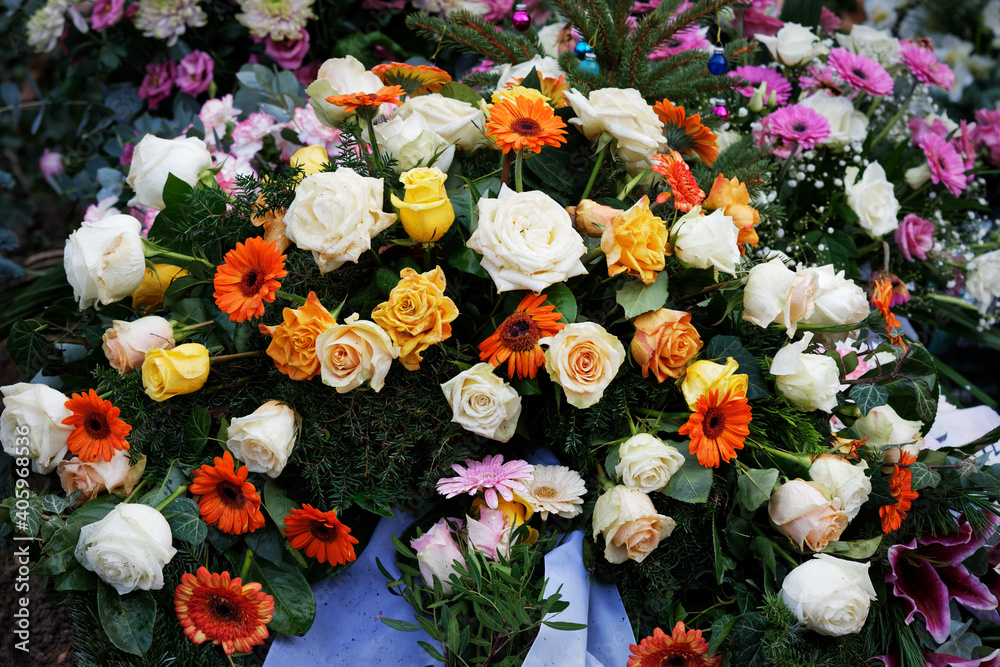 flower decoration on a grave after a funeral