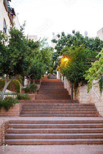 Typical view in Jerusalem, Israel. Stairs on the street and fruit trees around it