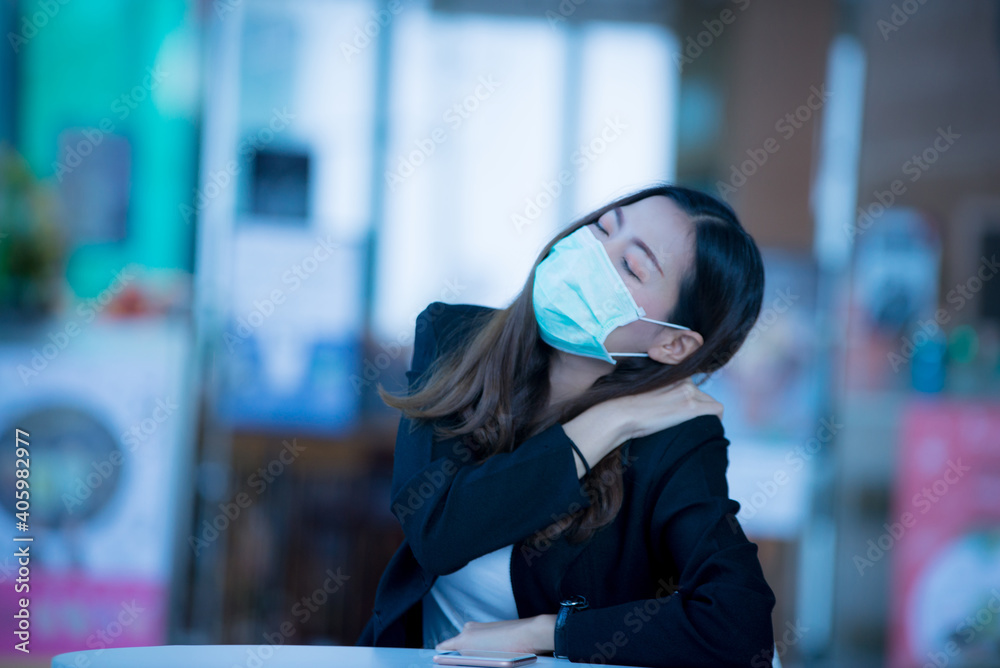 Corona virus, or Covid-19, is spreading all over the world. Business women wear masks Because he was infected with a virus