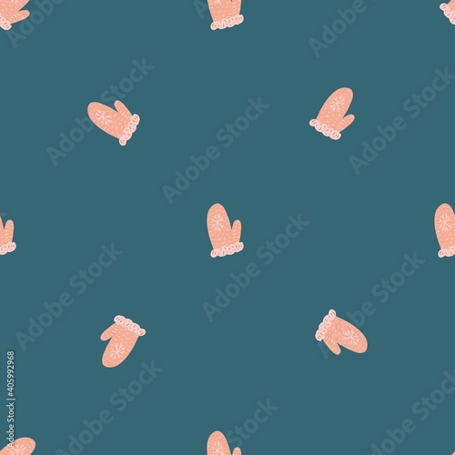 Abstract winter cozy pink mittens seamless pattern. Dark navy blue background. Hand drawn print.
