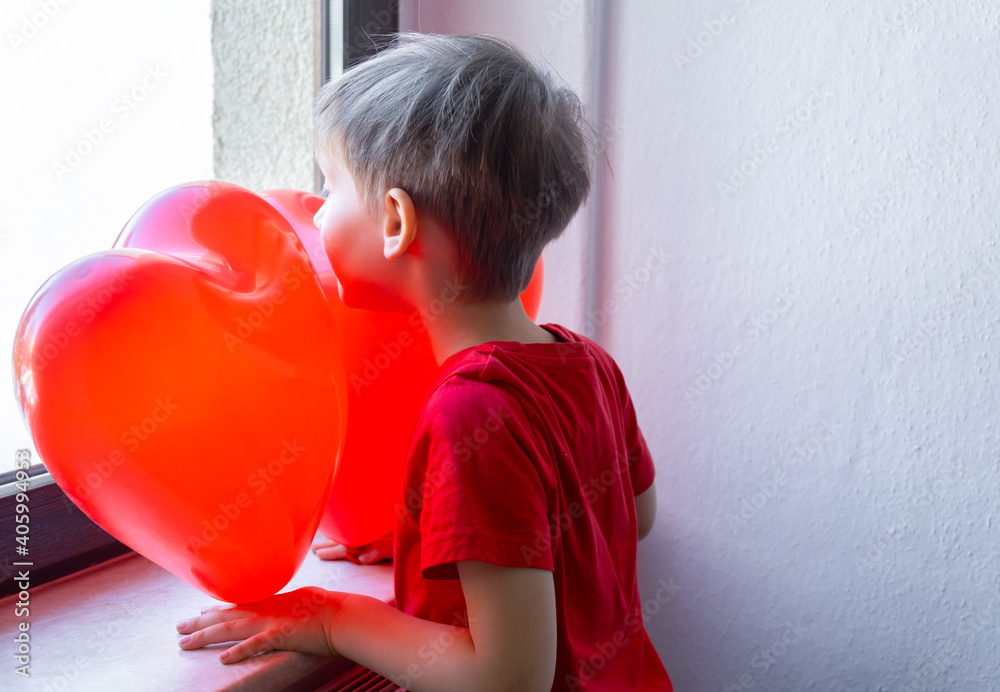 little boy with blond hair with red balloons, valentine's day little boy with blond hair with red balloons, valentine's day