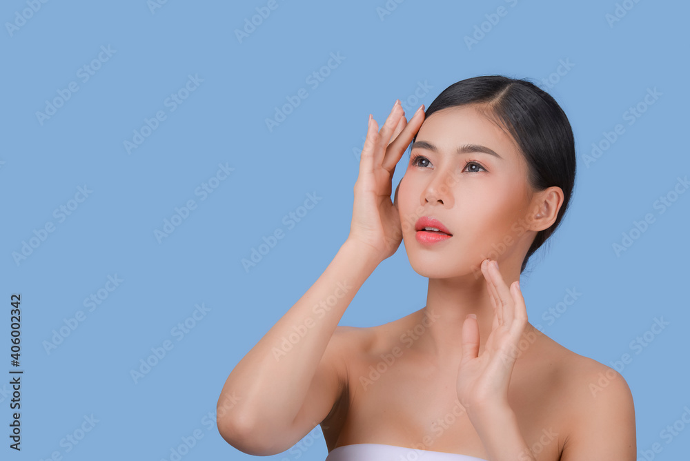 Beauty Spa Woman with perfect skin Portrait. Asian beautiful woman skin makeup young model, on blue studio Beauty Spa Woman with perfect skin Portrait. Asian beautiful woman skin makeup young model, on blue studio