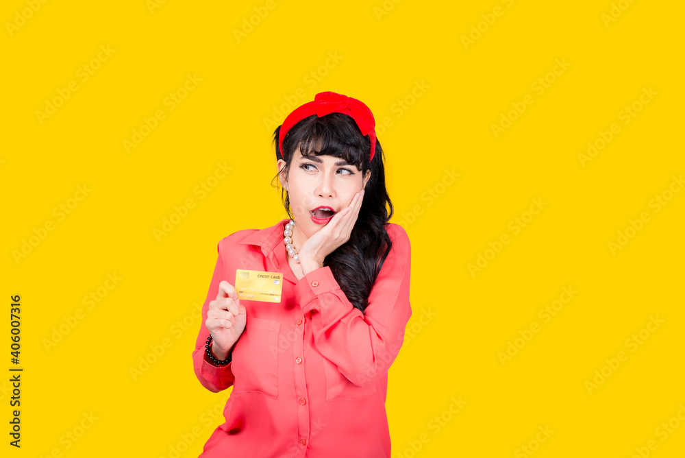 Young smiling Asian woman presenting credit card in hand showing trust and confidence for making payment,Reliable financial company Young smiling Asian woman presenting credit card in hand showing trust and confidence for making payment,Reliable financial company