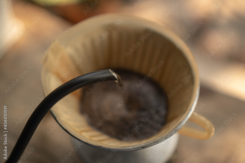 Fototapeta premium Barista Pouring hot water to coffee filter