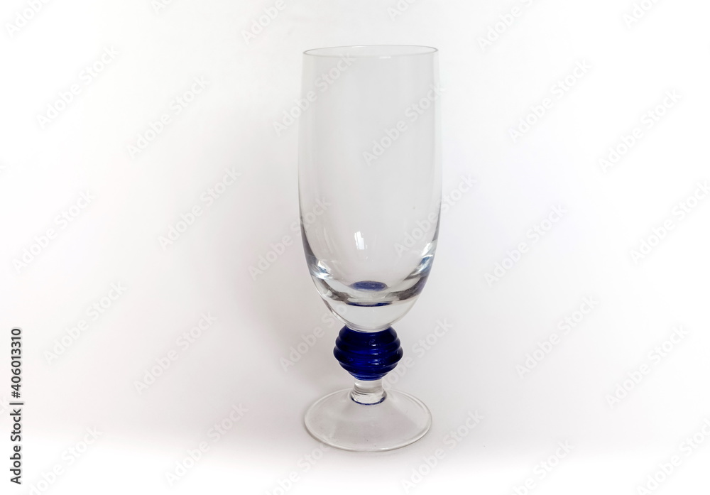 Glass shaped transparent wine glass close up on white background